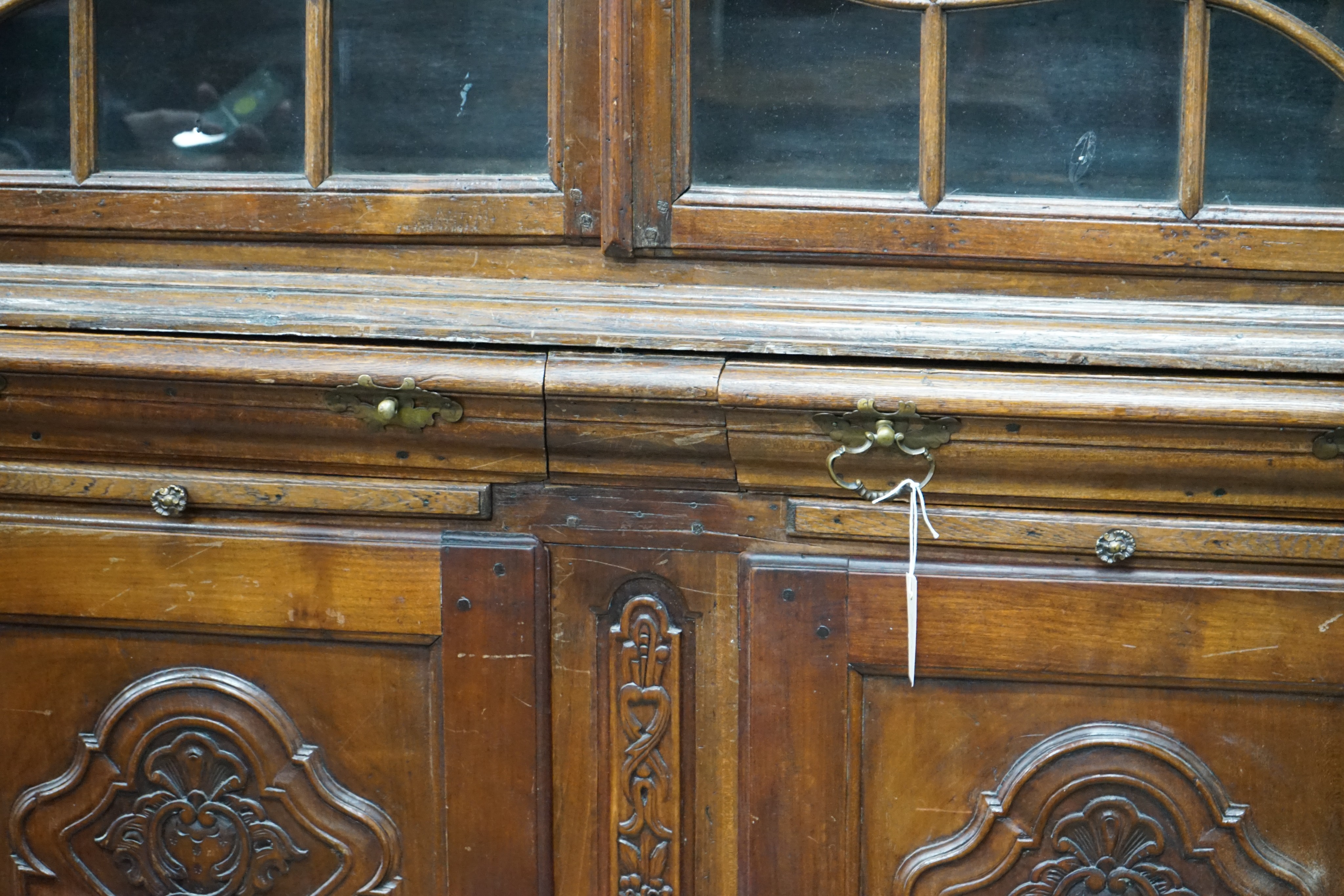 A 19th century Dutch oak and walnut glazed display cabinet, width 174cms, depth 47cms, height 227cms.